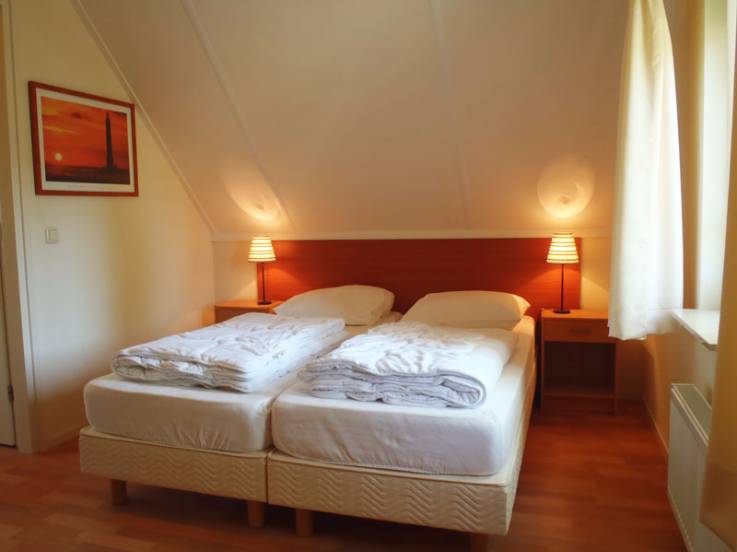 Slaapkamer boven - Vakantiehuis Nikki in Sondel, Friesland